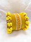 Pearl kara with velvet Bangles in yellow color.